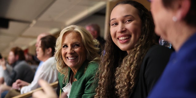 First Lady Jill Biden talks with guests while watching the 2023 NCAA Women's Basketball Tournament National Championship at American Airlines Center on April 2, 2023 in Dallas, Texas.