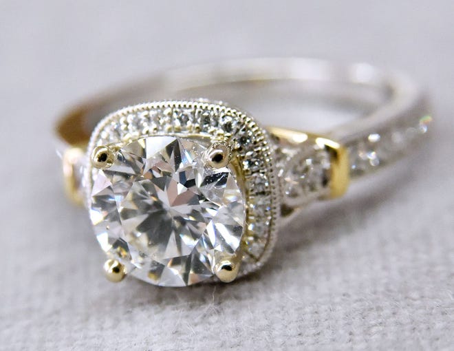 A diamond engagement ring.