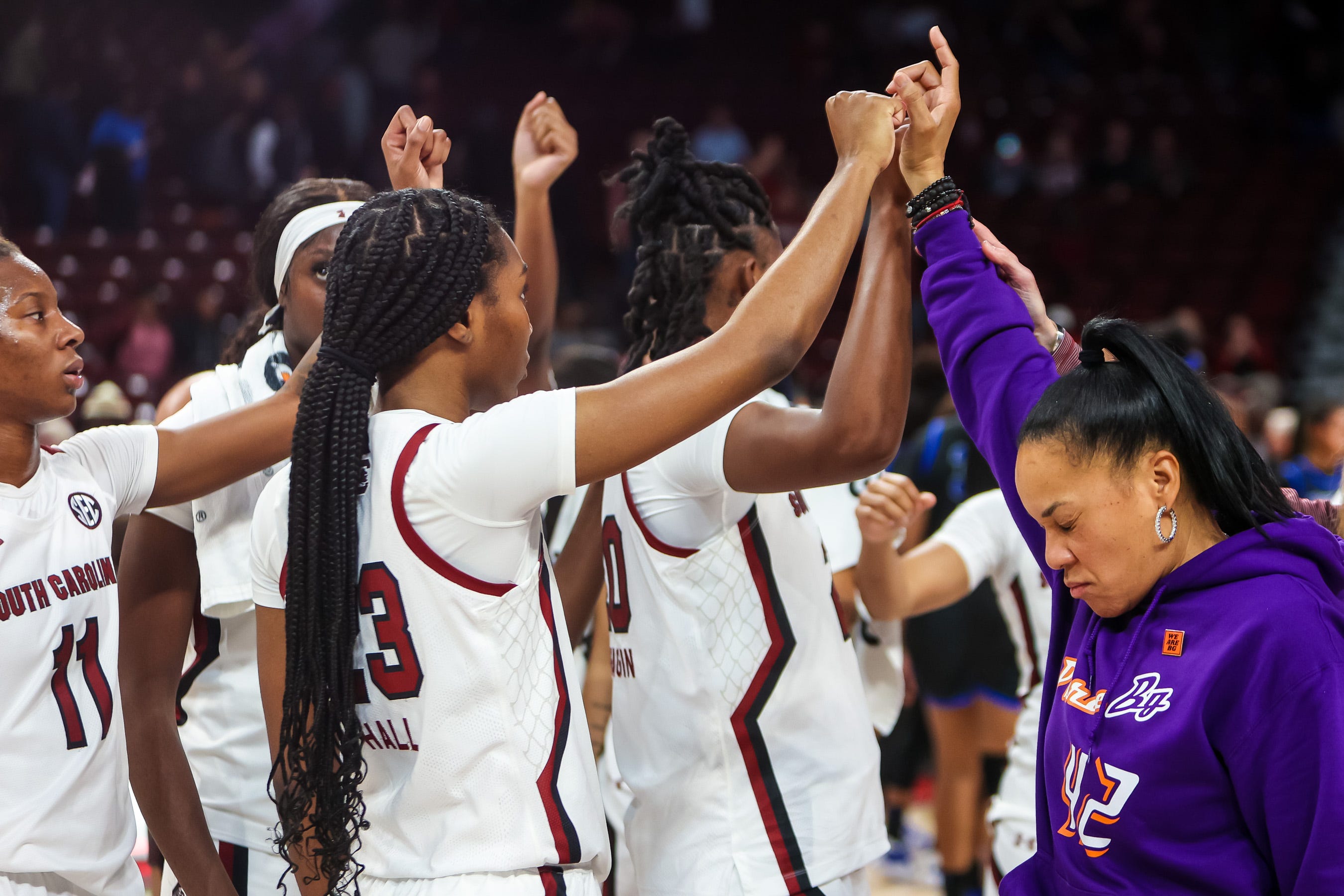 South Carolina Gamecocks head coach Dawn Staley huddles with her team following their win over the Memphis Tigers in the second half at Colonial Life Arena on Dec. 3, 2022.