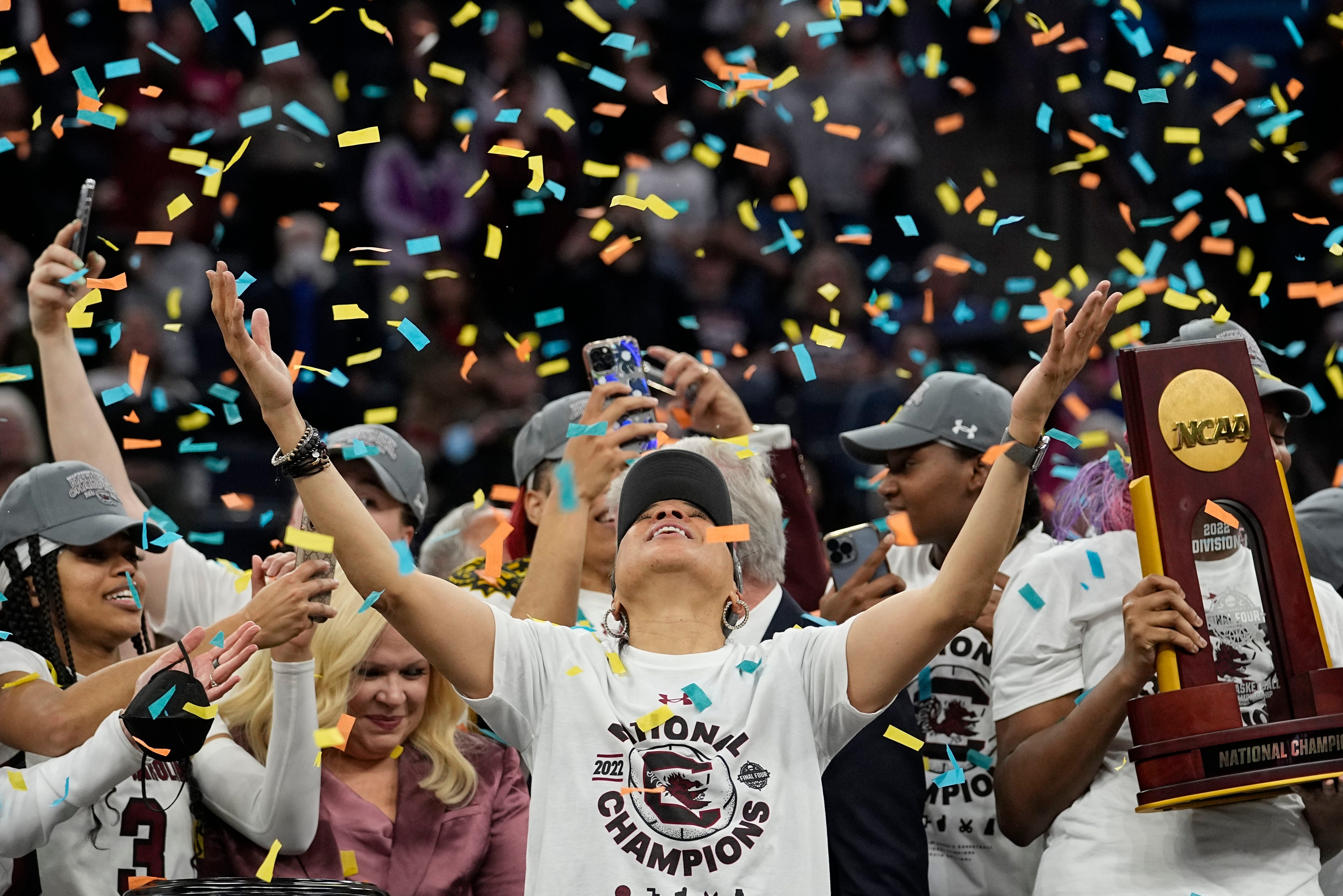 South Carolina head coach Dawn Staley celebrates after a college basketball game in the final round of the Women's Final Four NCAA tournament against UConn, April 3, 2022, in Minneapolis. South Carolina won 64-49 to win the championship.