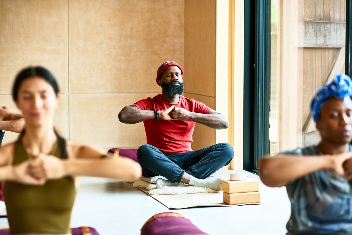 Man in yoga class