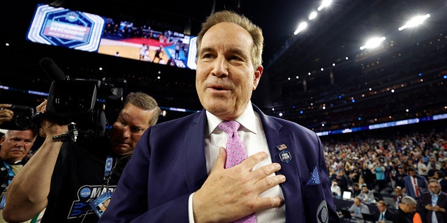 Jim Nantz on the court after Connecticut defeats San Diego State,76-59, during the NCAA championship game on April 3, 2023, in Houston.