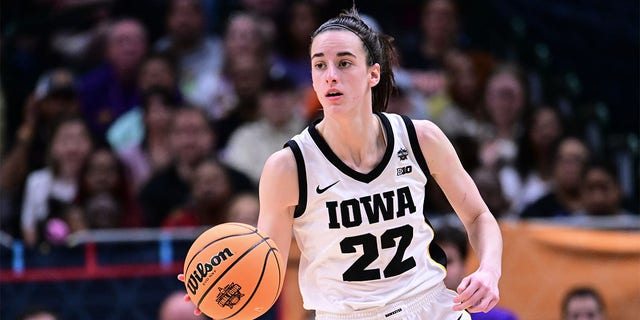 Iowa's Caitlin Clark dribbles the ball against Louisiana State during the NCAA championship game on April 2, 2023, in Dallas.