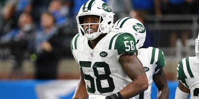 Darron Lee of the New York Jets intercepts a pass and runs it in for a touchdown against the Detroit Lions at Ford Field Sept. 10, 2018, in Detroit.  