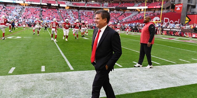 Owner Michael Bidwill of the Arizona Cardinals walks along the sidelines prior to a game against the Los Angeles Chargers at State Farm Stadium Nov. 27, 2022, in Glendale, Ariz.