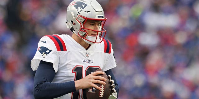 Mac Jones, #10 of the New England Patriots, warms up prior to a game against the Buffalo Bills at Highmark Stadium on Jan. 8, 2023 in Orchard Park, New York.