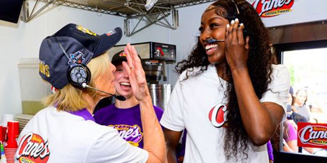 Kim Mulkey, left, and Flau'jae Johnson at Raising Canes.