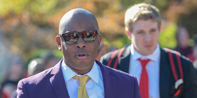 Nebraska Cornhuskers interim head coach Mickey Joseph leads the team on the walk to the stadium before the game Illinois Fighting Illini at Memorial Stadium on Oct. 29, 2022 in Lincoln, Nebraska.