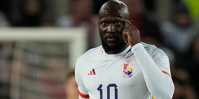 Belgium's Romelu Lukaku gestures as celebrates after scoring the second goal against Germany during the international friendly soccer match between Germany and Belgium in Cologne, Germany, Tuesday March 28, 2023. 