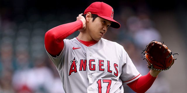 Shohei Ohtani of the Los Angeles Angels reacts during the first inning against the Seattle Mariners at T-Mobile Park April 5, 2023, in Seattle.