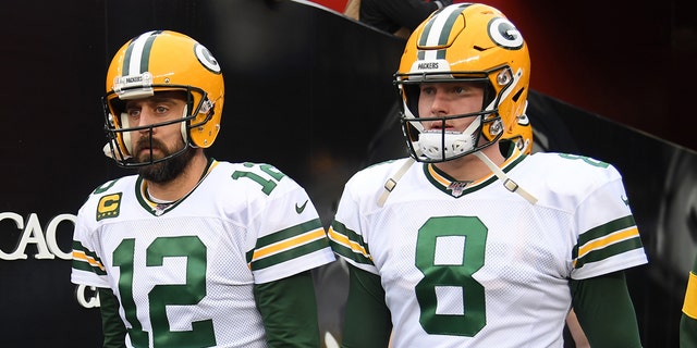 Aaron Rodgers and Tim Boyle of the Green Bay Packers head to the field for the NFC Championship game against the San Francisco 49ers at Levi's Stadium on Jan. 19, 2020, in Santa Clara, California.