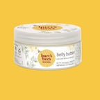 A tub of Burts Bees belly butter