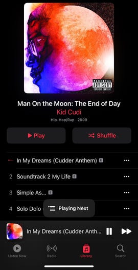 The Kid Cudi album Man On the Moon artwork with the track list below