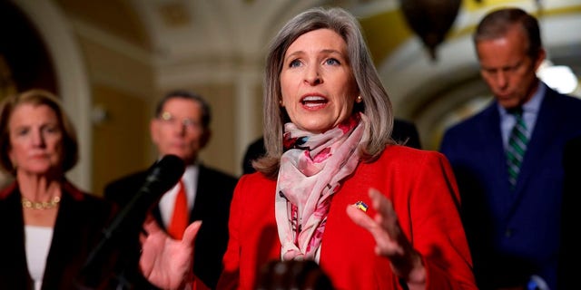 Sen. Joni Ernst (R-IA) talks to reporters following the weekly Senate Republican policy luncheon in the U.S. Capitol on Feb. 14, 2023 in Washington, D.C. 