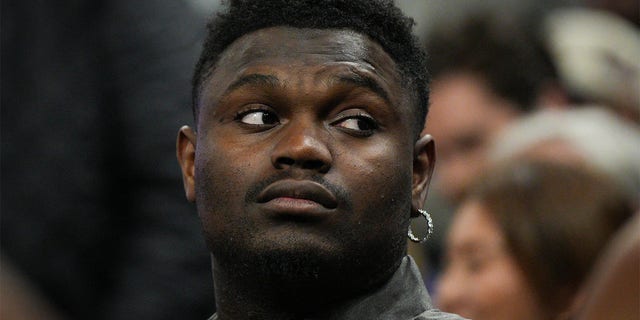 Zion Williamson, #1 of the New Orleans Pelicans, out due to injury, watches from the bench during a game against the Golden State Warriors at Chase Center on March 28, 2023, in San Francisco, California.  