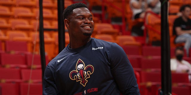 Zion Williamson, #1 of the New Orleans Pelicans, looks on during warm-ups before the preseason game against the Miami Heat on October 12, 2022, at FTX Arena in Miami, Florida. 