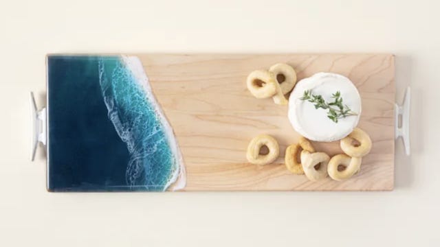 Maple cutting board with cheese and bread