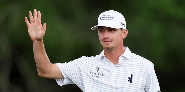 Sam Bennett reacts on the 18th green during the second round of the 2023 Masters Tournament at Augusta National Golf Club in Augusta, Georgia, on Friday.