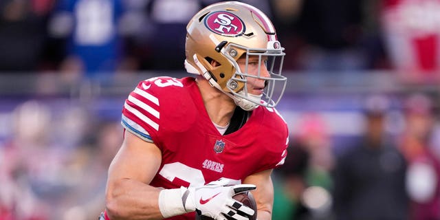 Christian McCaffrey of the San Francisco 49ers carries the ball against the Dallas Cowboys during the first quarter in an NFC divisional playoff game at Levi's Stadium Jan. 22, 2023, in Santa Clara, Calif. 