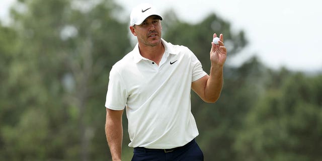 Brooks Koepka of the United States reacts on the 18th green during the second round of the 2023 Masters Tournament at Augusta National Golf Club on April 7, 2023, in Augusta, Georgia.