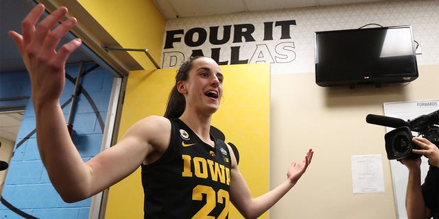 Caitlin Clark, #22 of the Iowa Hawkeyes, celebrate a win over the South Carolina Gamecocks during the semifinals of the NCAA Women's Basketball Tournament Final Four at American Airlines Center on March 31, 2023, in Dallas, Texas. 