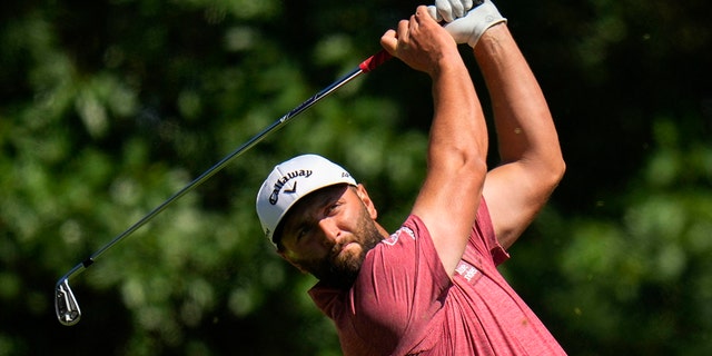 Jon Rahm of Spain watches his tee shot on the fourth hole during the final round of the Masters golf tournament at Augusta National Golf Club on Sunday, April 9, 2023, in Augusta, Ga.