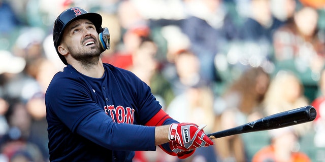 Adam Duvall #18 of the Boston Red Sox hits a double against the Detroit Tigers during the eighth inning at Comerica Park on April 8, 2023, in Detroit, Michigan. Duval scored in the inning on a single by Alex Verdugo.