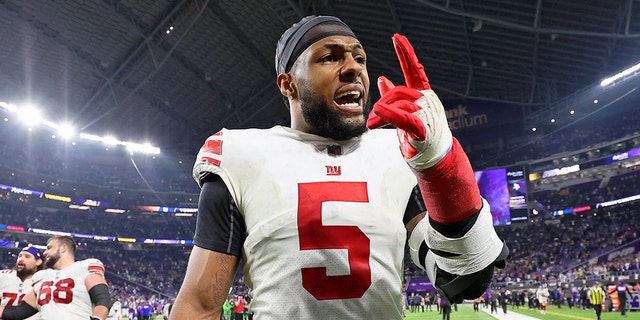 Jan 15, 2023; Minneapolis, Minnesota, USA; New York Giants defensive end Kayvon Thibodeaux (5) reacts after winning a wild card game against the Minnesota Vikings at U.S. Bank Stadium.