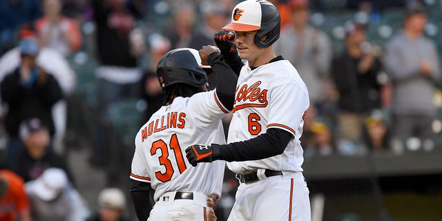 Baltimore Orioles first baseman Ryan Mountcastle celebrates with center fielder Cedric Mullins after his two-run homer against the Oakland Athletics at Camden Yards on April 10, 2023, in Baltimore.