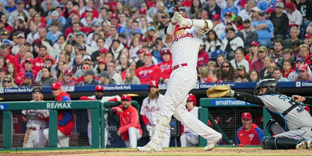 Ohillies right fielder Nick Castellanos hits a double against the Miami Marlins on April 10, 2023, at Citizens Bank Park in Philadelphia.