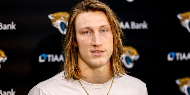 Jaguars quarterback Trevor Lawrence talks with the media after winning the AFC wild-card playoff game against the Los Angeles Chargers at TIAA Bank Field on Jan. 14, 2023, in Jacksonville, Florida.