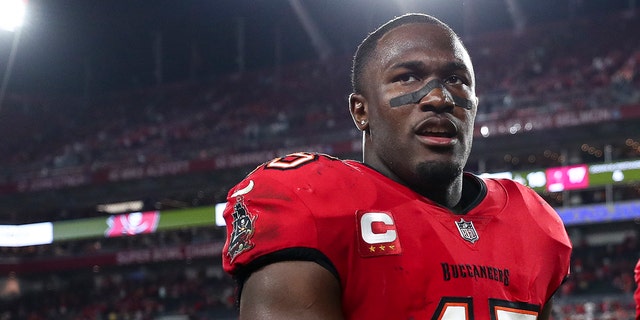 Devin White #45 of the Tampa Bay Buccaneers walks to the locker room after an NFL football game against the New Orleans Saints at Raymond James Stadium on December 5, 2022 in Tampa, Florida.