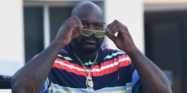 Shaquille O'Neal arrives the circuit before the qualifying ahead of the Formula 1 Abu Dhabi Grand Prix at Yas Marina Circuit in Abu Dhabi, United Arab Emirates on November 19, 2022.