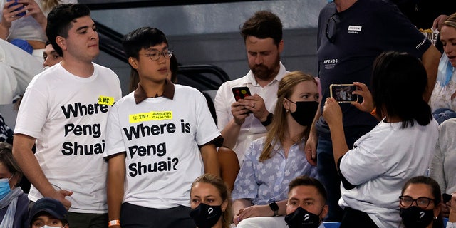 Supporters of Chinese tennis player Peng Shuai attend the women's final at the Australian Open in Melbourne, Jan. 29, 2022.