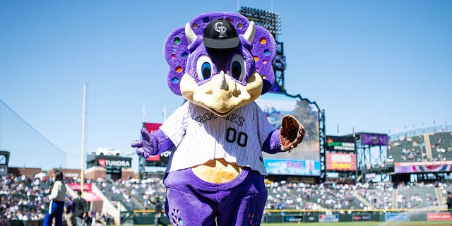 Dinger, the Colorado Rockies mascot, before the Los Angeles Dodgers game at Coors Field on April 8, 2022, in Denver.