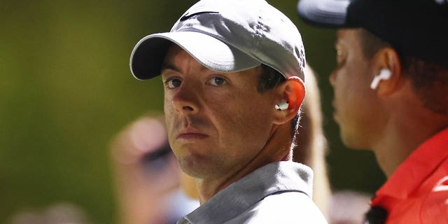 Rory McIlroy of Northern Ireland and Tiger Woods of the United States during The Match 7 at Pelican Golf Club Dec. 10, 2022, in Belleair, Fla. 