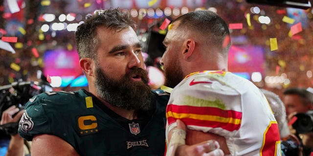 Jason Kelce of the Philadelphia Eagles, left, speaks with Travis Kelce of the Kansas City Chiefs after Super Bowl LVII at State Farm Stadium Feb. 12, 2023, in Glendale, Ariz. The Chiefs defeated the Eagles 38-35. 