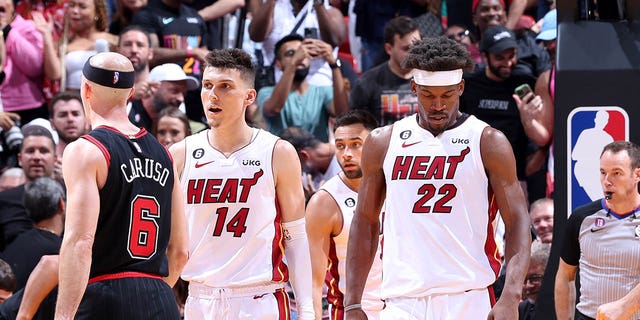 Tyler Herro (14) and Jimmy Butler (22) of the Miami Heat during a game against the Chicago Bulls during the 2023 play-in tournament April 14, 2023, at Kaseya Center in Miami, Fla. 