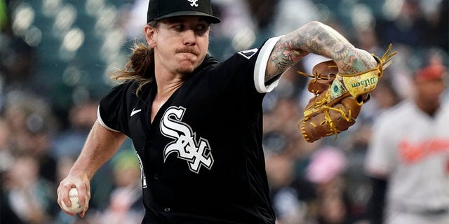 Mike Clevinger, #52 of the Chicago White Sox, throws a pitch during the second inning against the Baltimore Orioles at Guaranteed Rate Field on April 14, 2023, in Chicago, Illinois. 