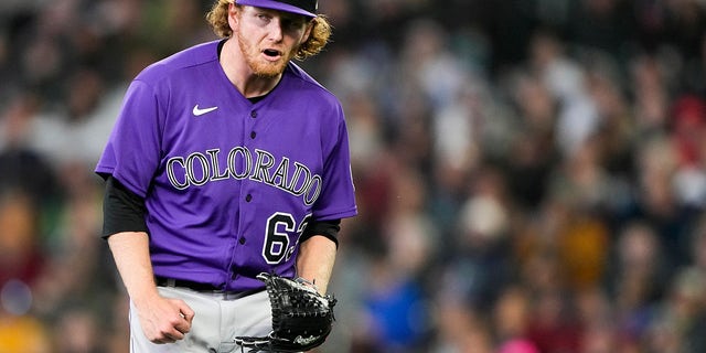 Colorado Rockies starting pitcher Noah Davis reacts after a double play to end the third inning against the Mariners, Sunday, April 16, 2023, in Seattle.