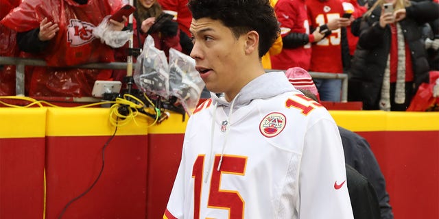 Kansas City Chiefs quarterback Patrick Mahomes (15) brother Jackson Mahomes before an AFC divisional playoff game between the Jacksonville Jaguars and Kansas City Chiefs on January 21, 2023 at GEHA Field at Arrowhead Stadium in Kansas City, MO.