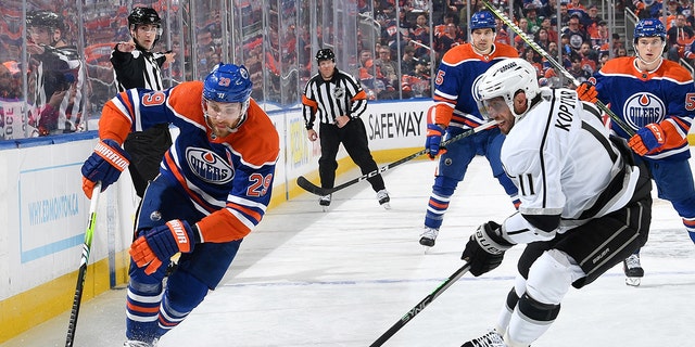 Leon Draisaitl #29 of the Edmonton Oilers skates against Anze Kopitar #11 of the Los Angeles Kings in Game One of the First Round of the 2023 Stanley Cup Playoffs at Rogers Place on April 17, 2023, in Edmonton, Alberta, Canada.