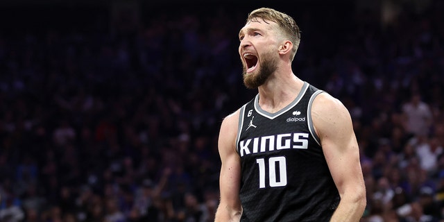 Domantas Sabonis #10 of the Sacramento Kings reacts after missing a basket against the Golden State Warriors in the first half of Game Two of the Western Conference First Round Playoffs at Golden 1 Center on April 17, 2023 in Sacramento, California. 