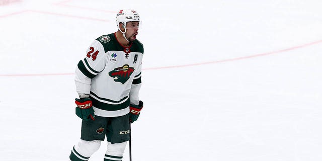 Matt Dumba, #24 of the Minnesota Wild, celebrates after the Wild beat the Dallas Stars 3-2 in the second overtime period in Game One of the First Round of the 2023 Stanley Cup Playoffs at American Airlines Center on April 18, 2023 in Dallas.