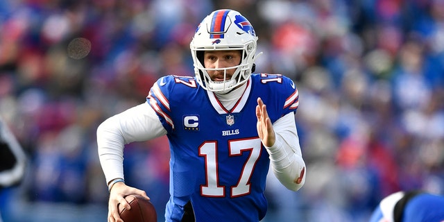 Buffalo Bills quarterback Josh Allen looks to pass during the first half of an NFL wild-card playoff game against the Miami Dolphins Jan. 15, 2023, in Orchard Park, N.Y.