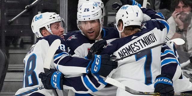 Winnipeg Jets right wing Blake Wheeler (26) celebrates after scoring against the Vegas Golden Knights during the third period of Game 1 of an NHL hockey Stanley Cup first-round playoff series Tuesday, April 18, 2023, in Las Vegas. 