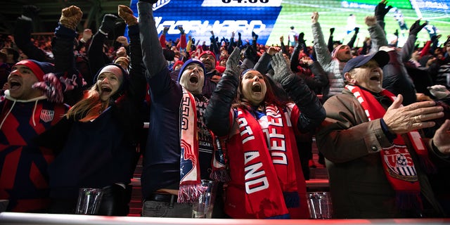 Fans celebrate the U.S. Men's National Team's second goal during a game between Mexico and USMNT at TQL Stadium on Nov. 12, 2021 in Cincinnati.