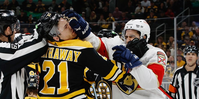 Garnet Hathaway #21 of the Boston Bruins and Colin White #6 of the Florida Panthers shove each other during the second period of Game One of the First Round of the 2023 Stanley Cup Playoffs at the TD Garden on April 17, 2023 in Boston, Massachusetts.