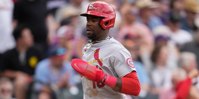 St. Louis Cardinals' Jordan Walker scores on a Paul Goldschmidt single against the Colorado Rockies on Wednesday, April 12, 2023, in Denver.