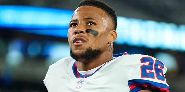 Saquon Barkley 26 of the New York Giants warms up before kickoff against the Dallas Cowboys at MetLife Stadium Sept. 26, 2022, in East Rutherford, N.J.